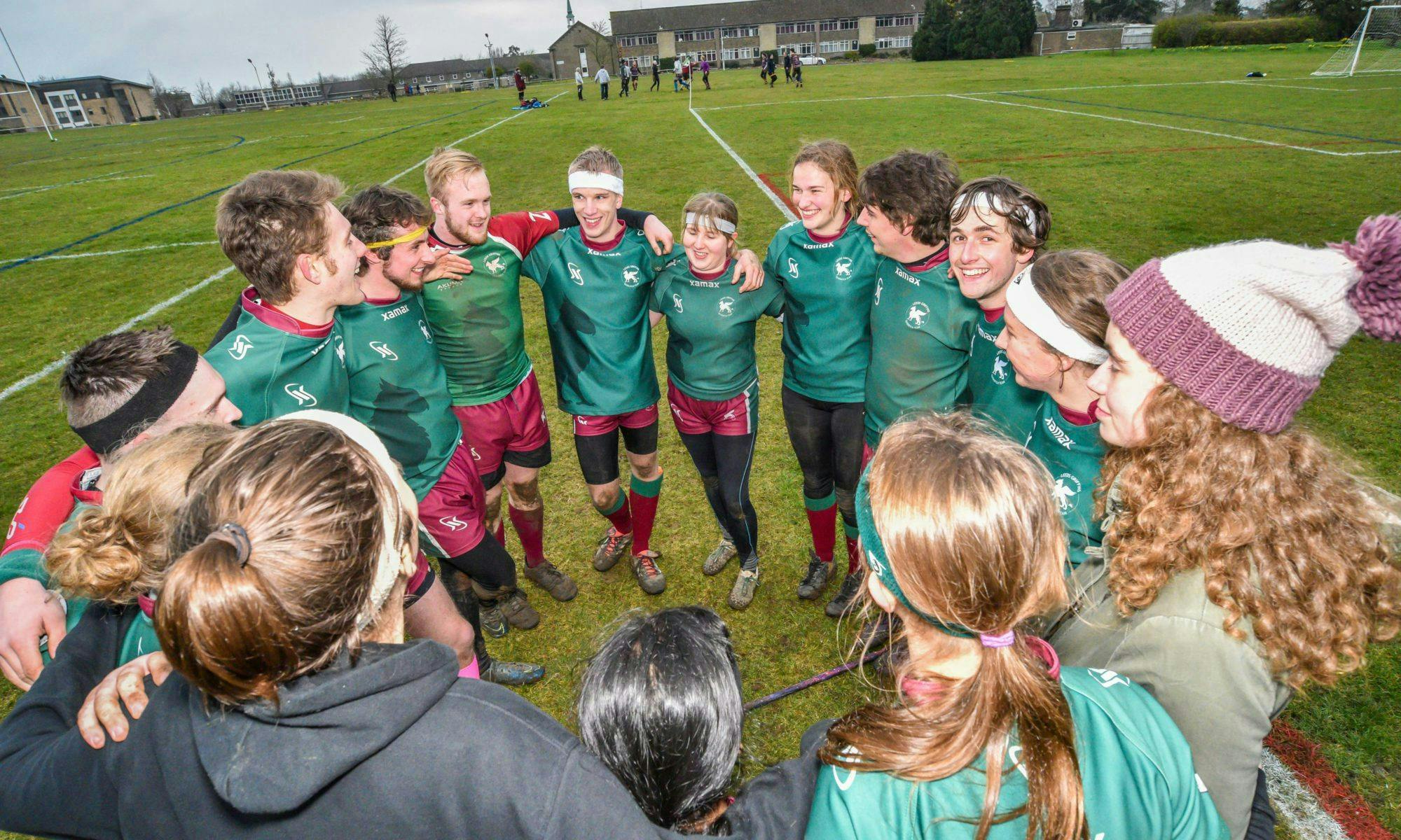 Leeds Griffins quidditch team in a huddle before/after a game at BQC 2018 in Oxford. 