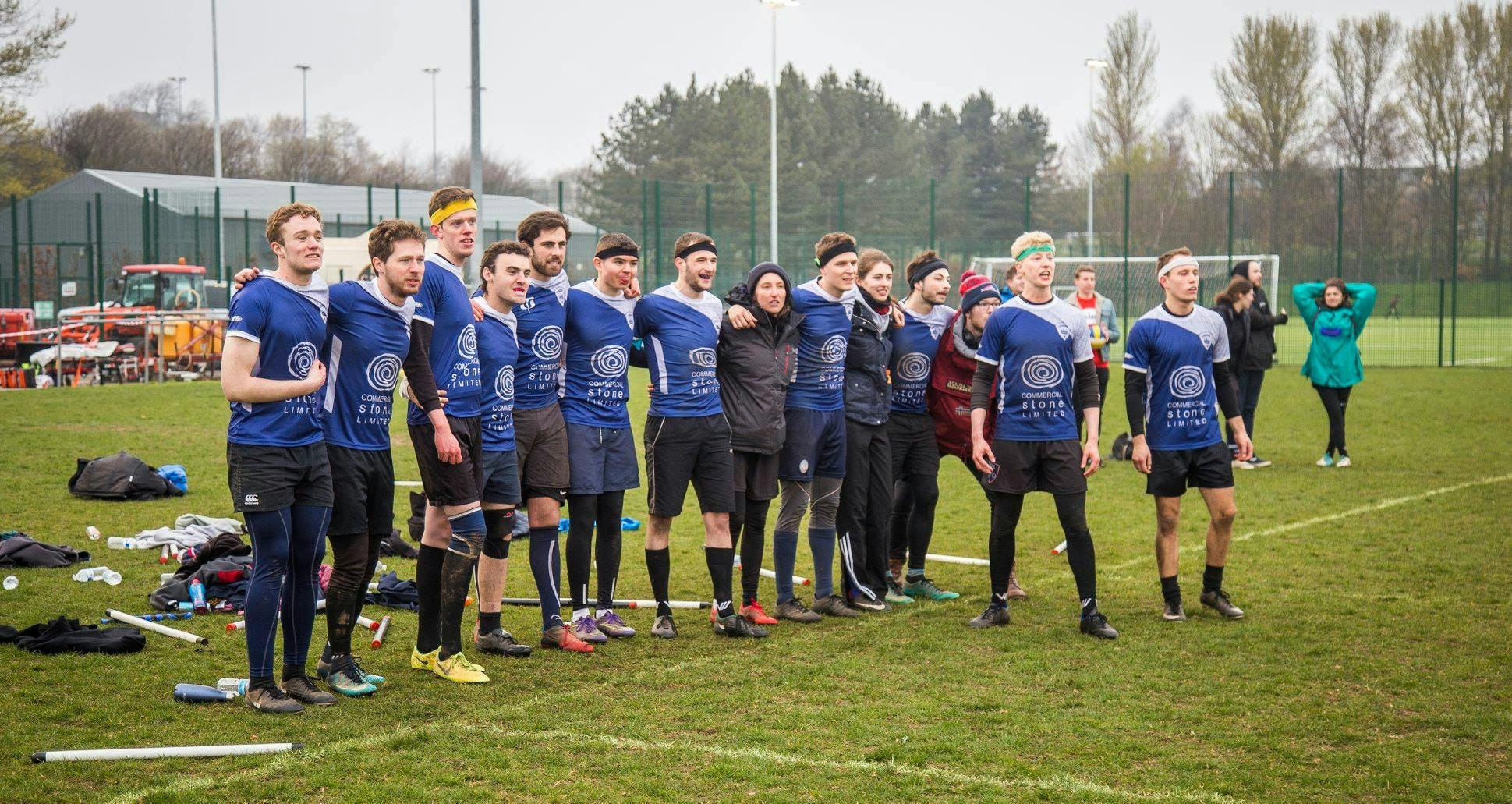 London Quidditch Club await a referees decision linked arm in arm