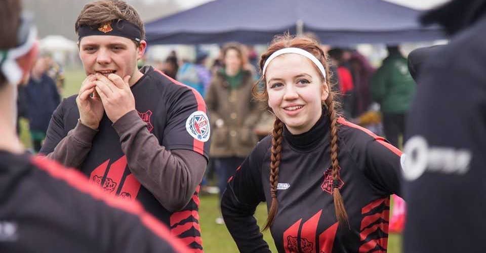 Beck Throup looks towards her fellow teammates during a before game huddle at British Quidditch Cup 2019.